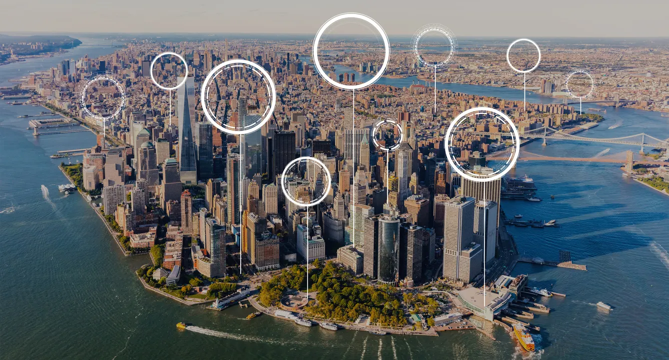 Aerial view of Manhattan with digital location markers